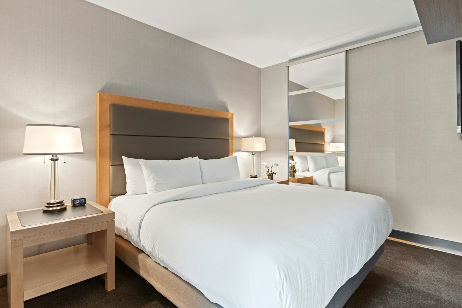 A made-up hotel room bed